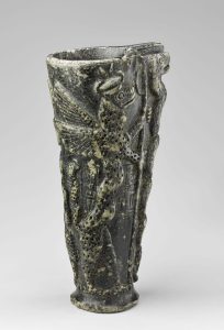 Dark chlorite libation goblet of Gudea decorated with Ningishzida and serpent imagery.
